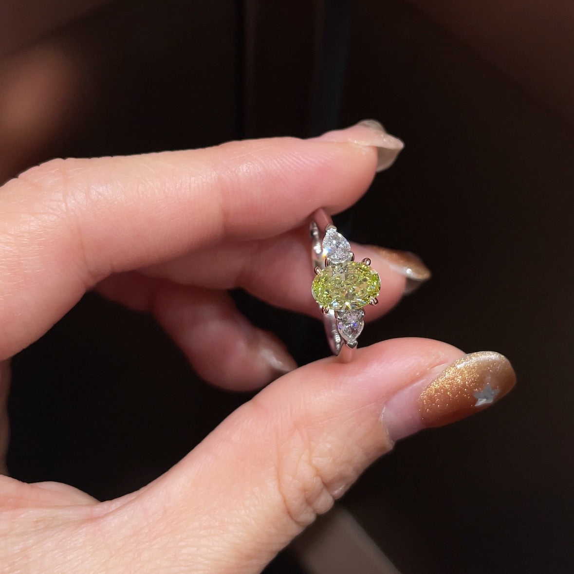18K White Gold Three-Stone Lab Grown Green Diamond Ring 1.12ct Main Stone 0.310ct Pear Side Stones IGI Certified