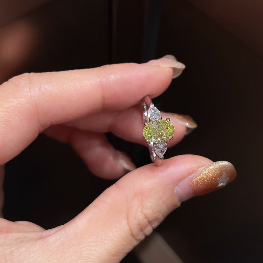 18K White Gold Three-Stone Lab Grown Green Diamond Ring 1.12ct Main Stone 0.310ct Pear Side Stones IGI Certified